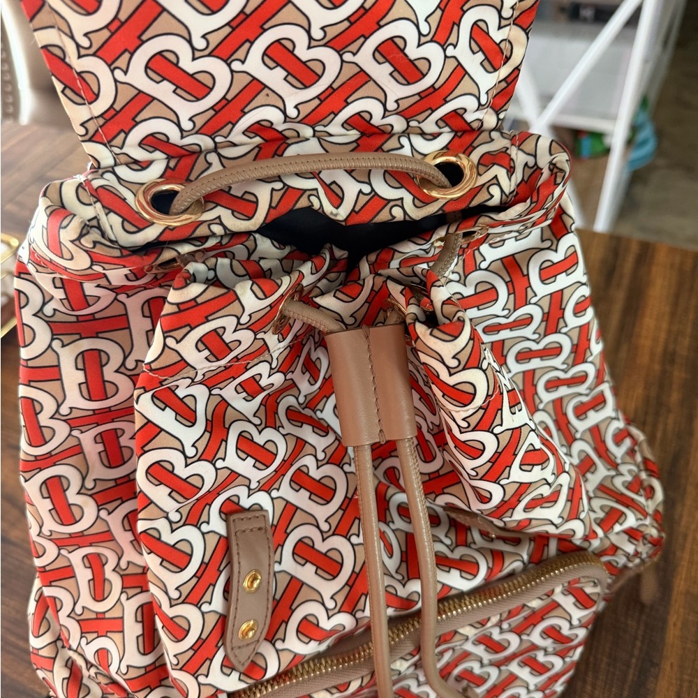 Chic Patterned Backpack with Tan and Red Accents - image 2